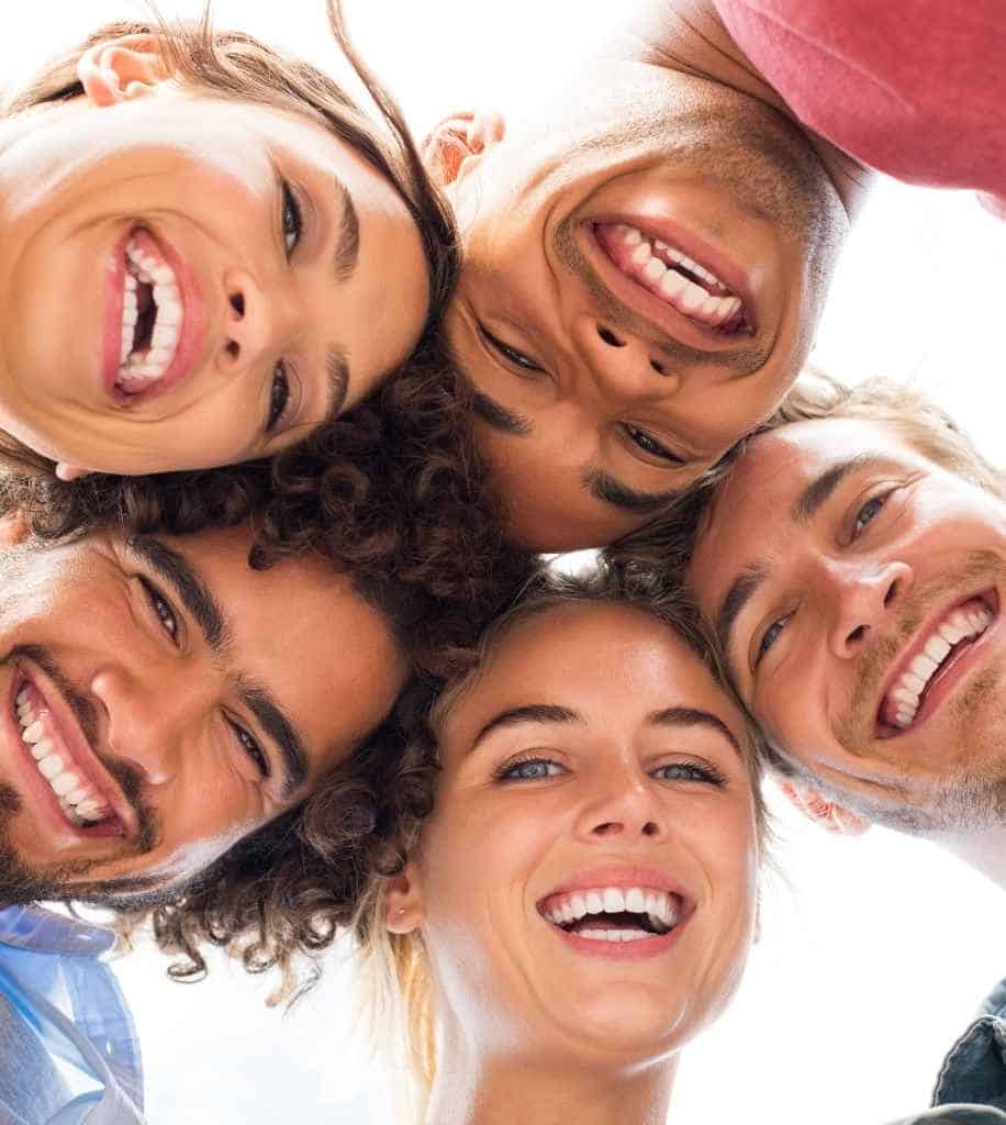 Smiling person showcasing white teeth after laser whitening treatment Chesham